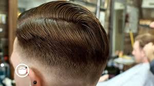 clic pompadour haircut at the