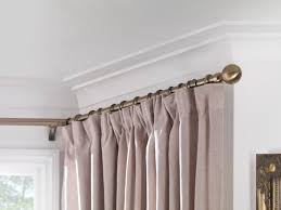 hang curtains in a bay window