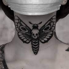 Moth throat tattoo traditional | Moth tattoo design, Throat tattoo,  Traditional moth tattoo
