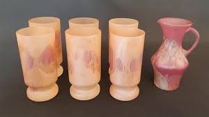 A Set Of Six Marbled Glass Tumblers