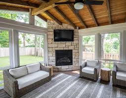 Three Season Room With Stone Fireplace