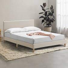 webster beige logan upholstered bed frame