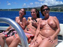 Plump tan mature enjoying a nude boat ride