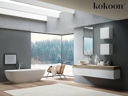 The brass mirror really stands out against the gray wallpaper while the two brown nickel and glass wall sconces tie it all together. Domayne Bathroom Design Introducing Kokoon Italian Bathroom Furniture Domayne Style Insider