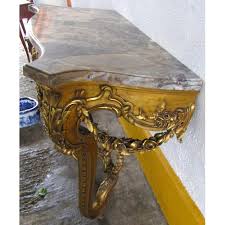 gilded serpentine front console table