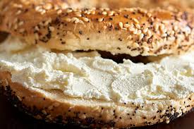 fresh bagels with cream cheese by jeff