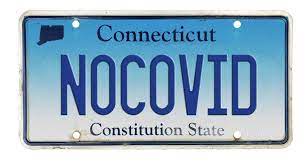 covid license plates are on the road in
