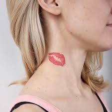 lip tattoo on neck meaning digging the