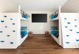 built in bunk beds with climbing wall