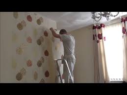Hanging Feature Wallpaper On A Chimney