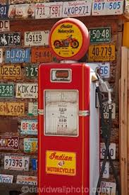 historic gasoline pump at hole n the