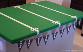 When you buy a foosball table, the rods with the players might not have been installed, and you will need to set them into the table. Easy Football Field Party Table A Night Owl Blog