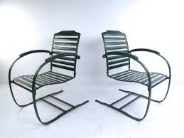pair of vintage metal spring chairs