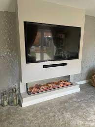 Build A Media Wall With A Fireplace