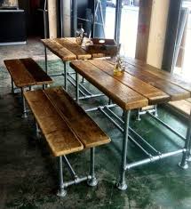 large reclaimed scaffold dining table