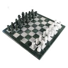 white marble chess set with green border