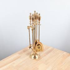 Fireplace Tool Set On The Brass Stand