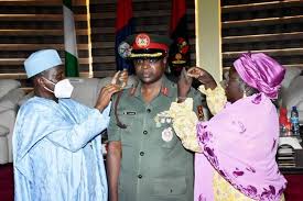 Minister Decorates Nysc Director