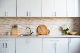 put s and handles on kitchen cabinets