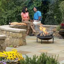The deeper, the higher the cost. Build A Flagstone And Stone Block Patio Diy Family Handyman