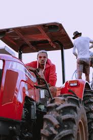 farmer on tractor mahindra tractor hd