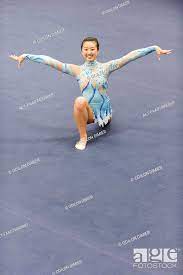 female gymnast performing floor routine