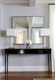 black console table with gold top