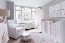 gray s nursery with pink rug