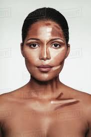 female face with makeup highlighting