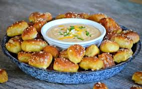 beer cheese dip and homemade pretzel bites
