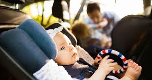 Child Sit In The Front Seat Of The Car