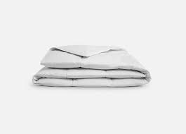 11 Best Summer Blankets To Keep Hot Sleepers Cool Purewow
