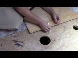 pipe holes in a hardwood floor