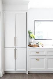 light gray kitchen cabinets with thin