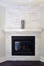 White Stone Corner Fireplace Design