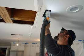 repairing a buckled ceiling remodeling