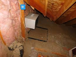 attic inspecting hvac systems