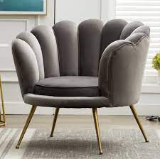 Typically, these depressions are secured with a button, knot or ribbon, although a more modern take is to leave them bare. Gold Flamingo Tyson 35 5 Wide Tufted Velvet Barrel Chair Reviews Wayfair