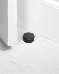 floor door stop in black by buster and