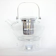 clear glass teapot with stainless steel
