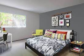 Bedroom With Light Gray Paint And Dark