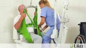 How to use a hoyer patient lift to transfer a patient from their wheelchair to a bed. Hill Rom Liko Lifts Slings Transfer From Chair To Toilet Youtube