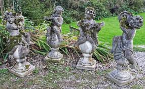 Four Classical Garden Statue Figures Of