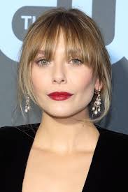 It has that appealing texture without being intentional. Elizabeth Olsen With Wispy Bangs 15 Celebrity Bangs You Ll Want To Copy Asap Popsugar Beauty Middle East Photo 9