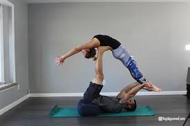 Keeping your hips facing forward, place the sole of your right foot inside your left thigh and find your balance. Intro To Acroyoga 5 Beginner Acroyoga Poses To Try Yogiapproved Com