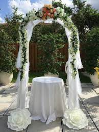 While many couples might prefer to build their wedding arch from wood, the classic white metal arch is still very popular. Decorated Wedding Arch Frame Happy Party Event Rentals