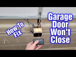 garage door won t close and light