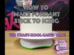 how to make fondant stick to icing the