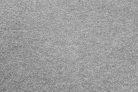 the texture of the grey carpet the