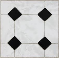 Front view of a wall made of rusty square shaped tiles or slabs. Classic Black White 5046 Adhesive Floor Wall Tiles 11 Tiles 1sqm